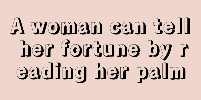 A woman can tell her fortune by reading her palm