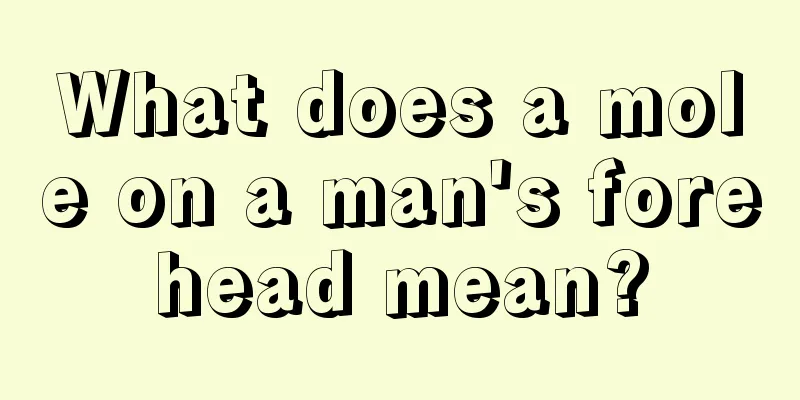 What does a mole on a man's forehead mean?