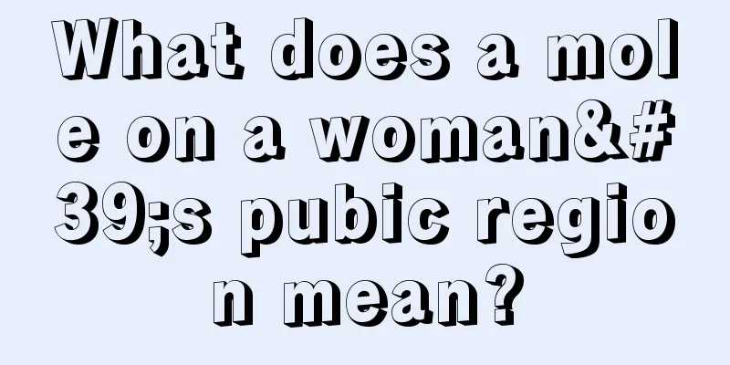 What does a mole on a woman's pubic region mean?