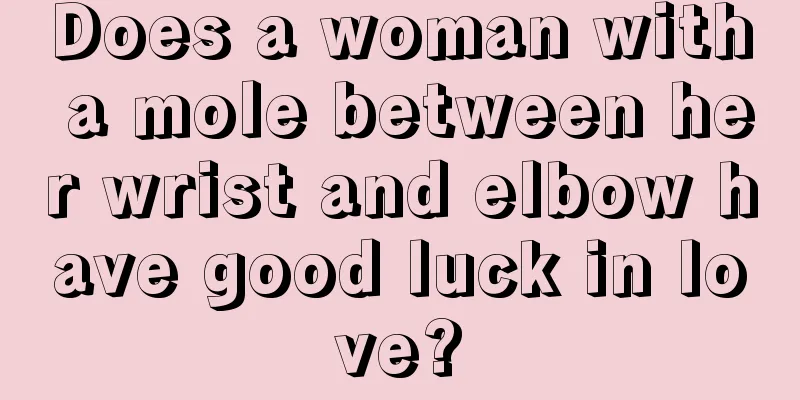 Does a woman with a mole between her wrist and elbow have good luck in love?