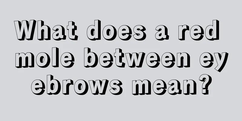 What does a red mole between eyebrows mean?