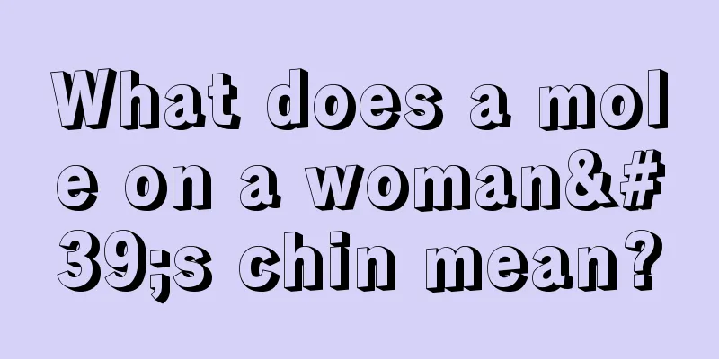 What does a mole on a woman's chin mean?