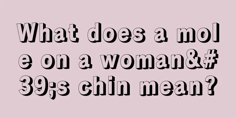 What does a mole on a woman's chin mean?