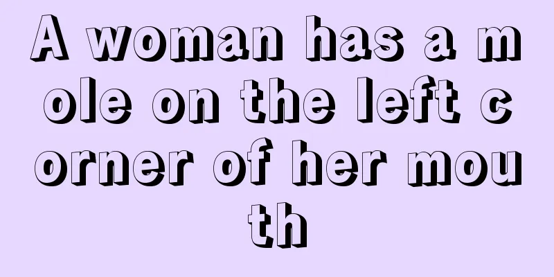 A woman has a mole on the left corner of her mouth