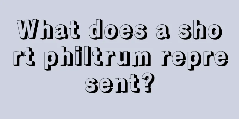 What does a short philtrum represent?