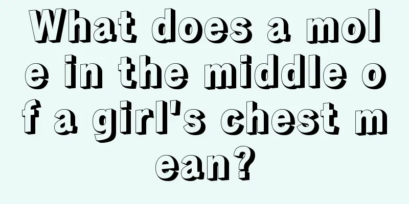 What does a mole in the middle of a girl's chest mean?