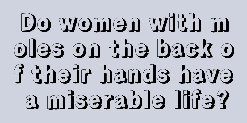 Do women with moles on the back of their hands have a miserable life?