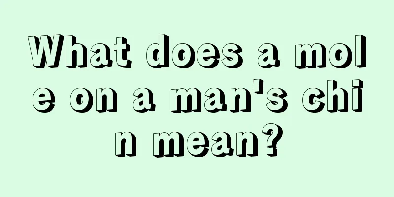 What does a mole on a man's chin mean?