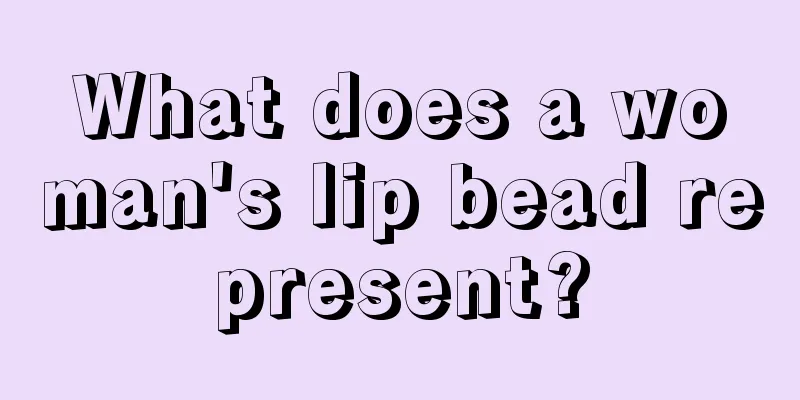 What does a woman's lip bead represent?