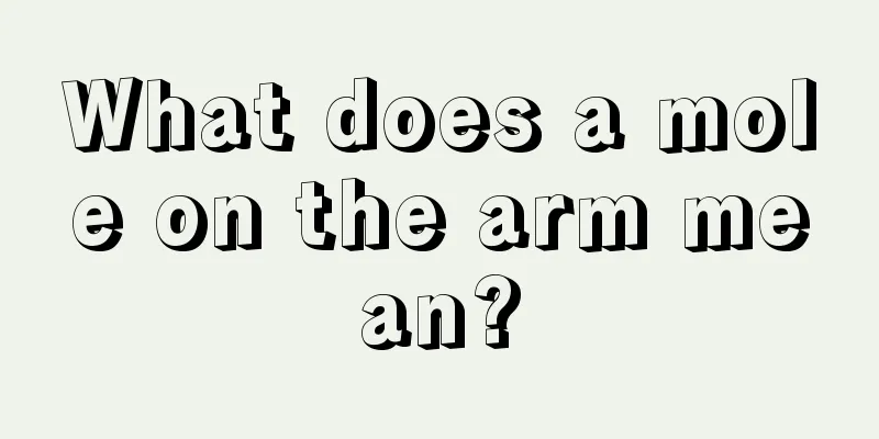 What does a mole on the arm mean?