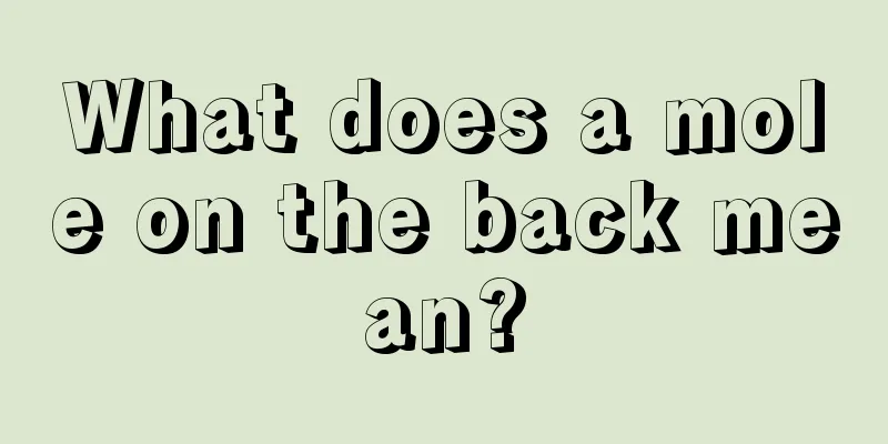 What does a mole on the back mean?