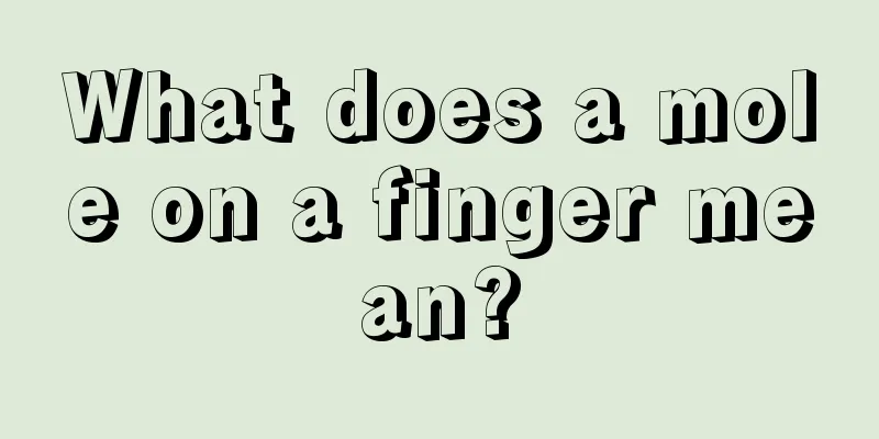 What does a mole on a finger mean?