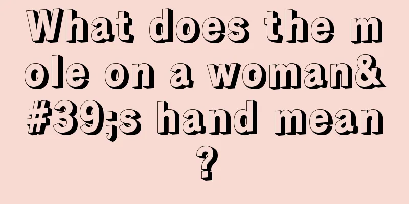 What does the mole on a woman's hand mean?