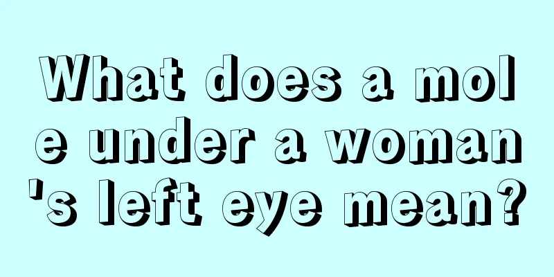 What does a mole under a woman's left eye mean?