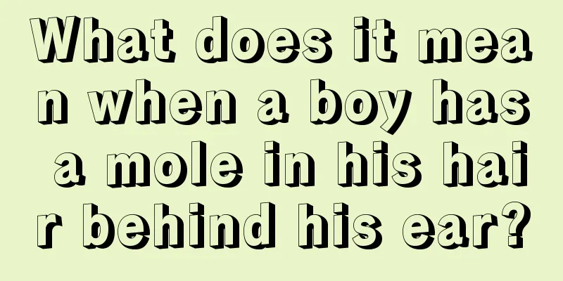 What does it mean when a boy has a mole in his hair behind his ear?