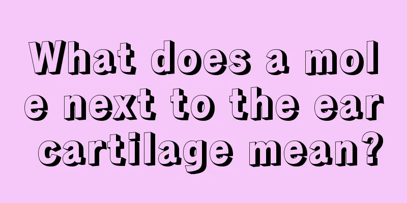 What does a mole next to the ear cartilage mean?