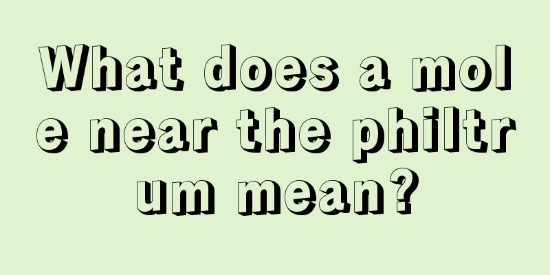 What does a mole near the philtrum mean?