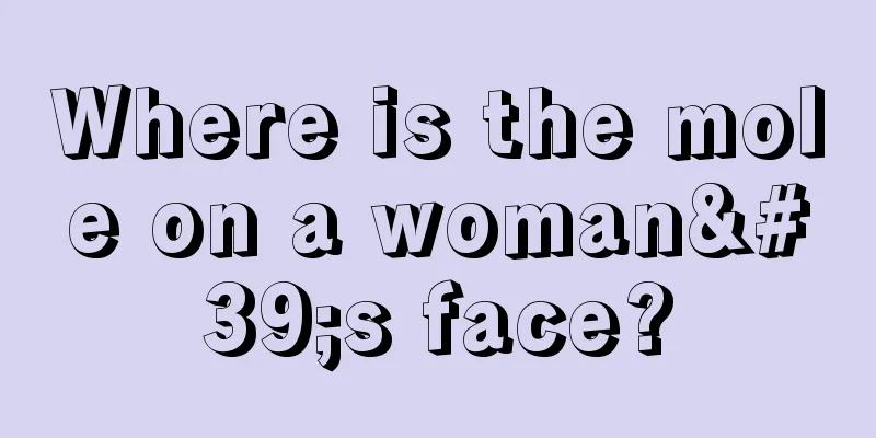 Where is the mole on a woman's face?