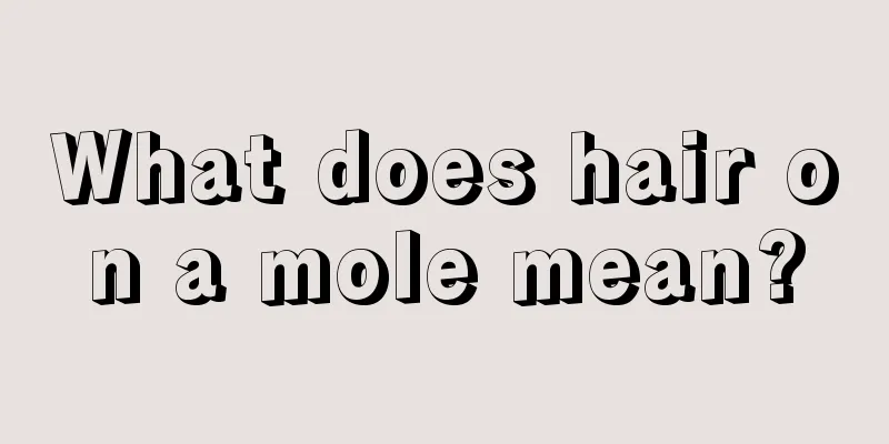 What does hair on a mole mean?