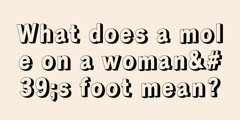 What does a mole on a woman's foot mean?