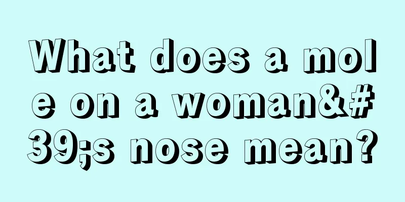 What does a mole on a woman's nose mean?