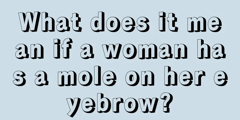 What does it mean if a woman has a mole on her eyebrow?