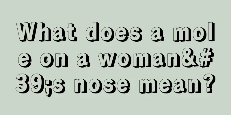 What does a mole on a woman's nose mean?