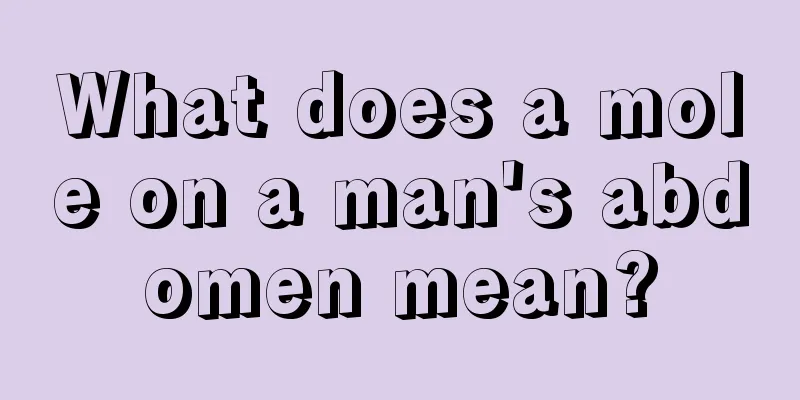What does a mole on a man's abdomen mean?