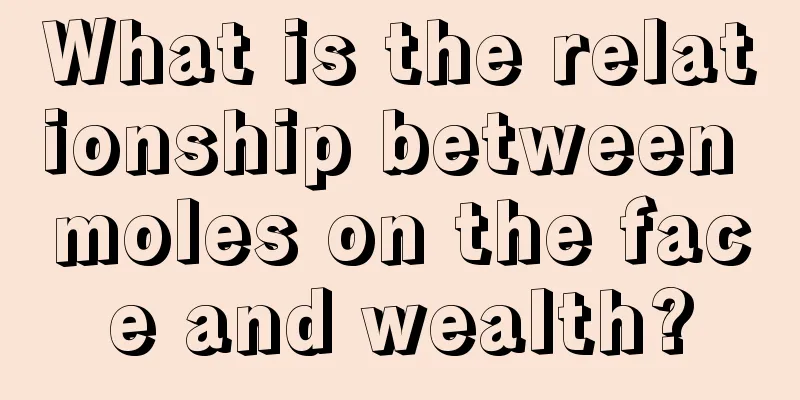 What is the relationship between moles on the face and wealth?