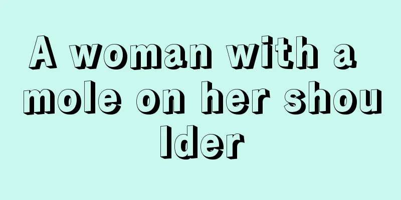 A woman with a mole on her shoulder