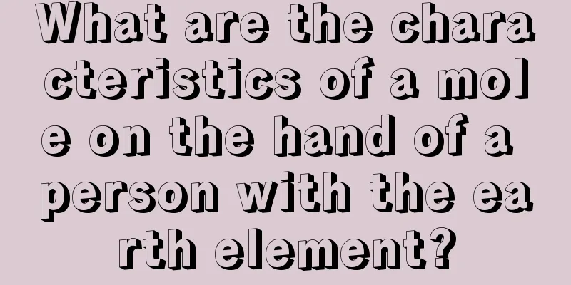 What are the characteristics of a mole on the hand of a person with the earth element?