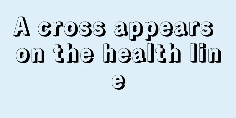 A cross appears on the health line