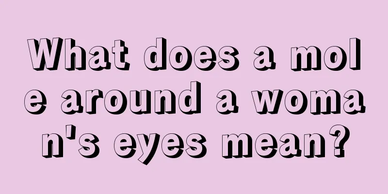 What does a mole around a woman's eyes mean?
