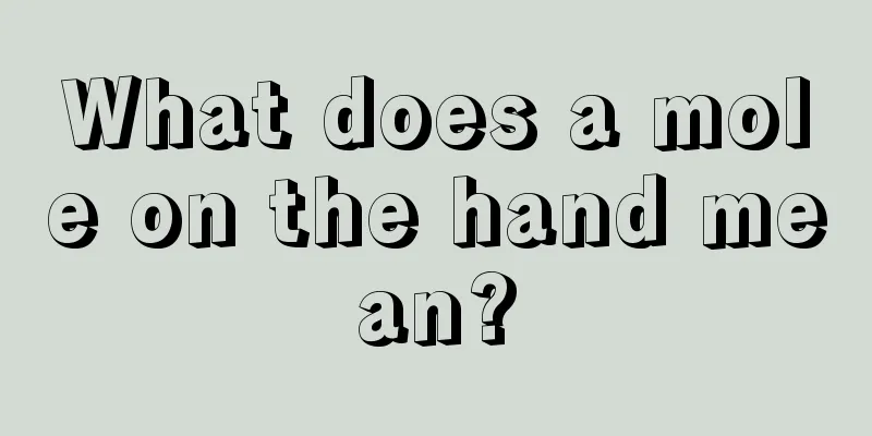 What does a mole on the hand mean?