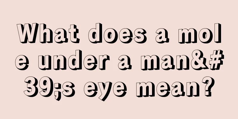 What does a mole under a man's eye mean?