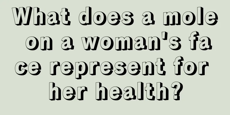 What does a mole on a woman's face represent for her health?