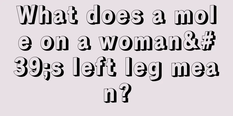 What does a mole on a woman's left leg mean?