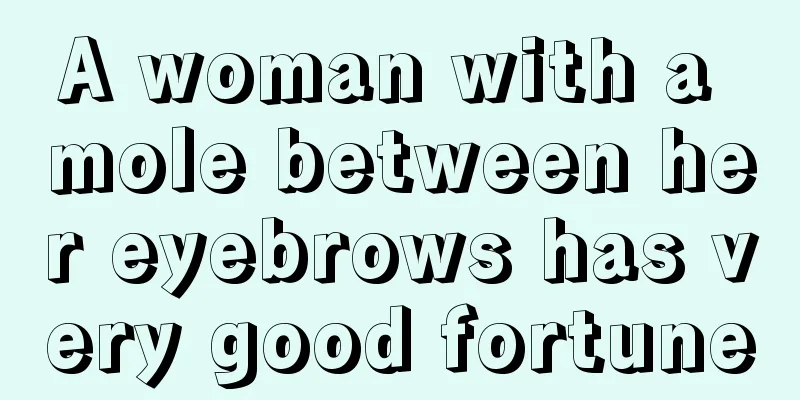 A woman with a mole between her eyebrows has very good fortune