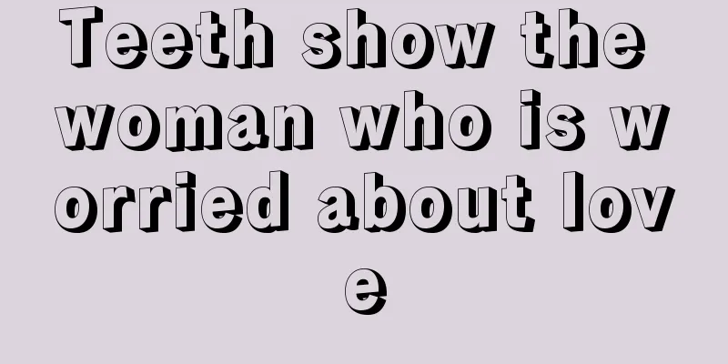 Teeth show the woman who is worried about love