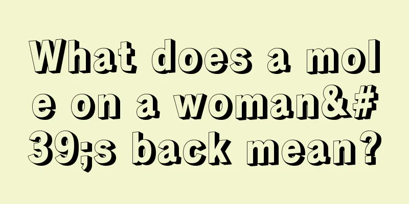What does a mole on a woman's back mean?
