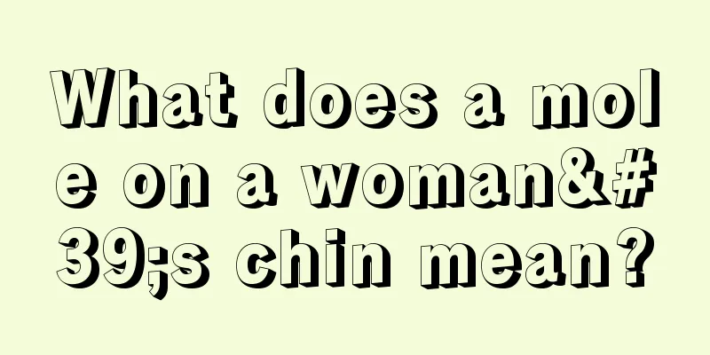 What does a mole on a woman's chin mean?