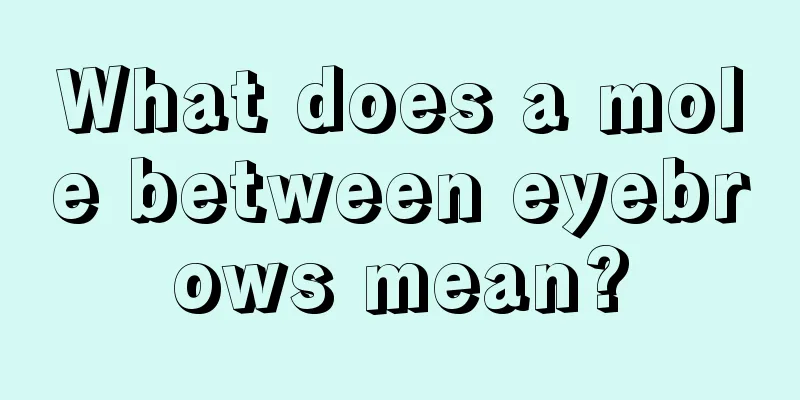 What does a mole between eyebrows mean?