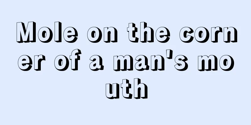 Mole on the corner of a man's mouth