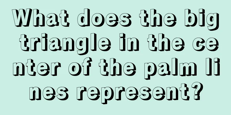 What does the big triangle in the center of the palm lines represent?