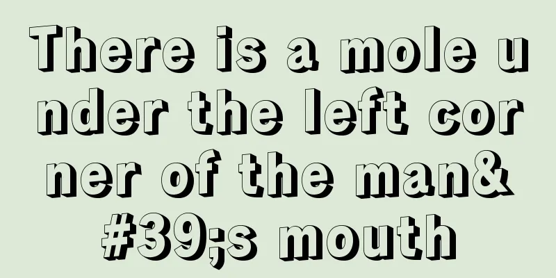 There is a mole under the left corner of the man's mouth