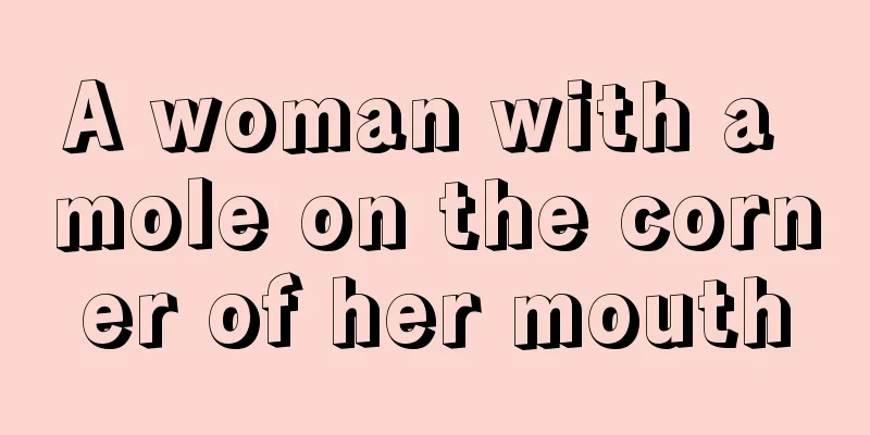 A woman with a mole on the corner of her mouth