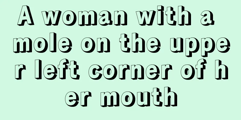 A woman with a mole on the upper left corner of her mouth